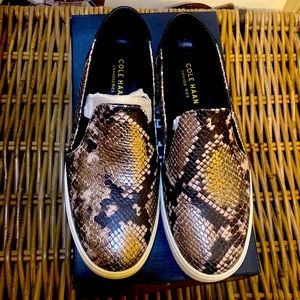 New and in original box! Cole Haan slip on metallic snakeskin-pattern sneaks!